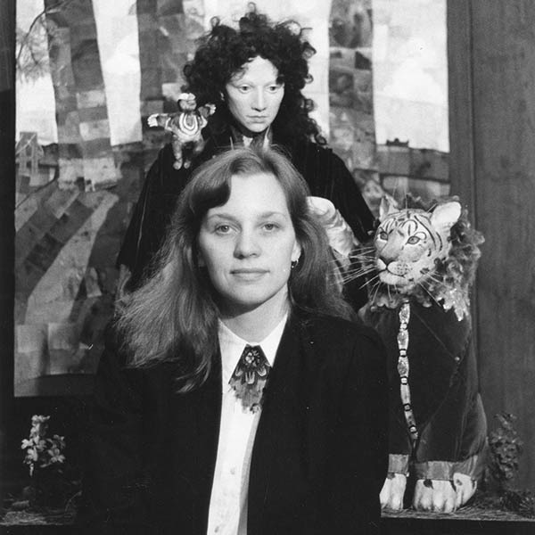 Artist photographed in front of Girl with Bird and Tiger - 1983